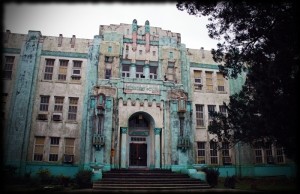 A moldy, mildewy ode to art deco birthday cakes everywhere, my middle school LOOKS like it should be haunted.