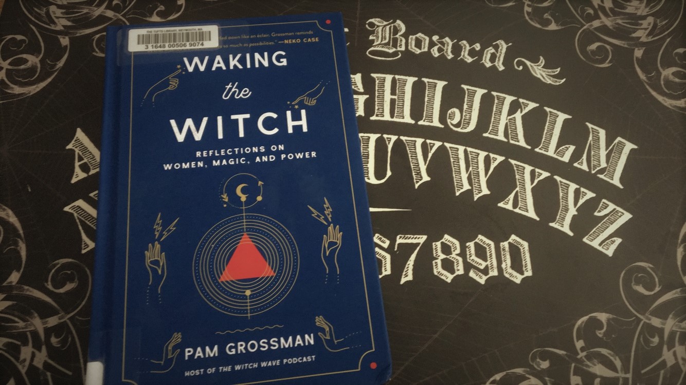 picture of a blue book on top of a Ouija board