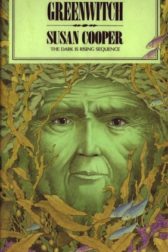 green face of a witch starring up from the sea