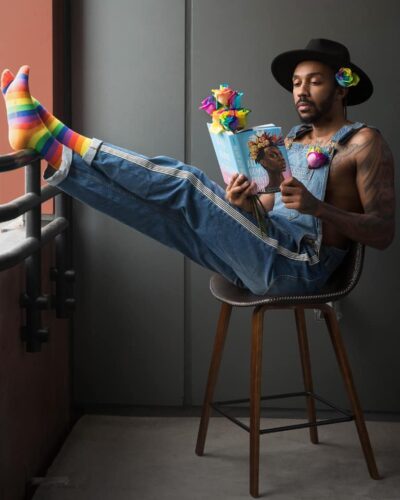 George M Johnson reading his book, All Boys Aren't Blue