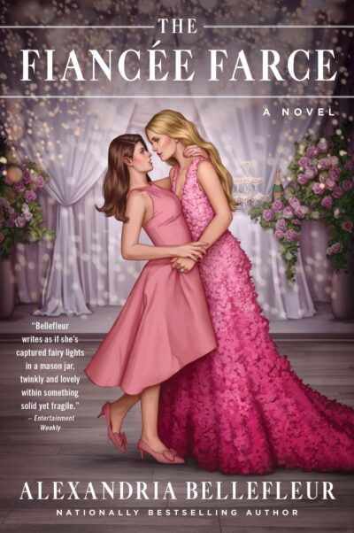 The cover of Alexandria Bellefleur's The Fiancee Farce. The image is an illustration of two femme white women embracing and gaing into each other's eyes. Both women are wearing fancy pink dresses and are standing in front of a wedding venue-ish backdrop with gauzy white curtains and pink and white floral arrangements. 
