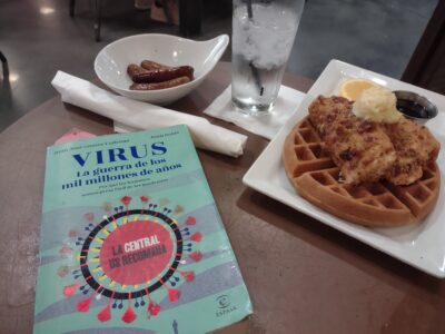 One well-travelled book in a bar in Houston with chicken and waffles.
