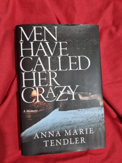 Cover of Anna Marie Tendler's book, with a woman lying alone in bed stretched across a pillow
