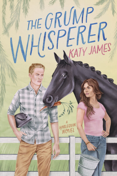 The cover of The Grump Whisperer by Katy James. The illustration is in a soft watercolor style. It shows a white man and a white woman standing in front of a white fence, the kind you would see in a horse pasture, with a black horse on the other side of the fence, but leaning it’s head between the two people. The man is holding a riding helmet and the woman is holding a feed bucket. The force has a carrot in his mouth. 