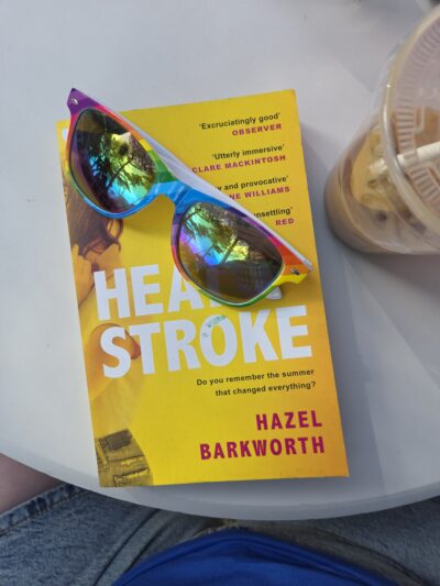 Cover of Heatstroke--yellow with a teenaged girl half turned away