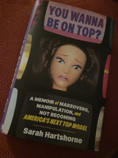 Cover of You Wanna Be On Top, featuring a plastic doll head looking sad