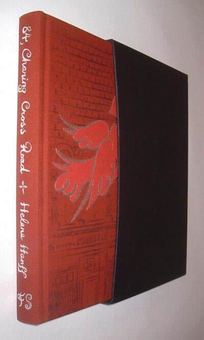 Cover and spine of 84, Charing Cross Road by Helene Hanff, Folio Society edition. red cover with silver type on the binding; a red bird delivering a letter on the cover